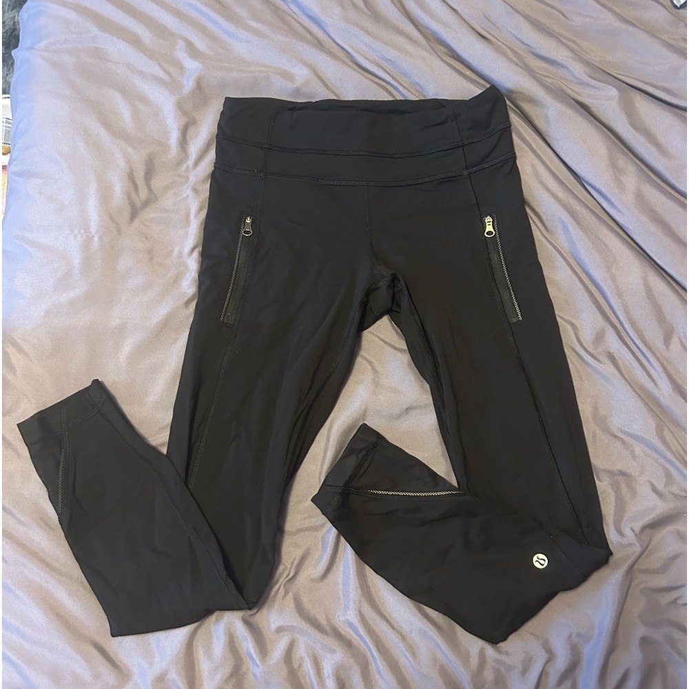 Black Lululemon leggings with zipper pockets